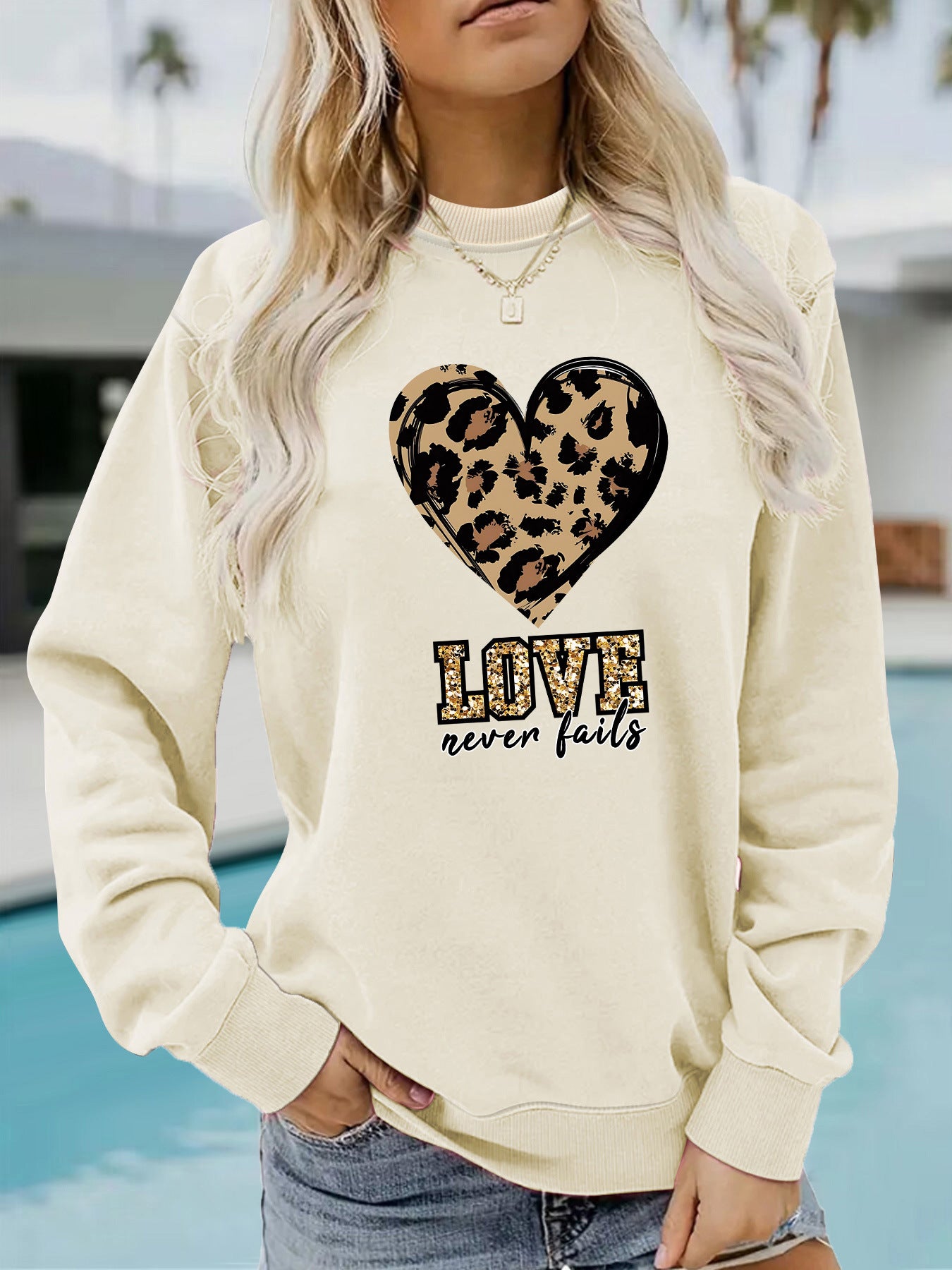 Love Never Fails Leopard Print Hoodie - Aesthetic Women’s Graphic Sweatshirt from Mish Mash Market