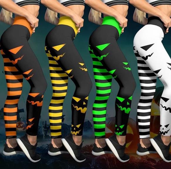Women's Halloween Pumpkin Face Striped Leggings from Mish Mash Market