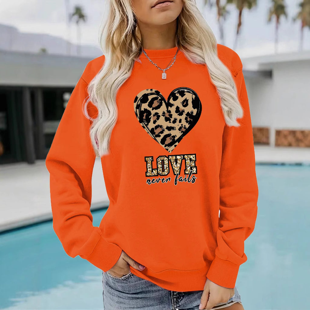 Love Never Fails Leopard Print Hoodie - Aesthetic Women’s Graphic Sweatshirt from Mish Mash Market