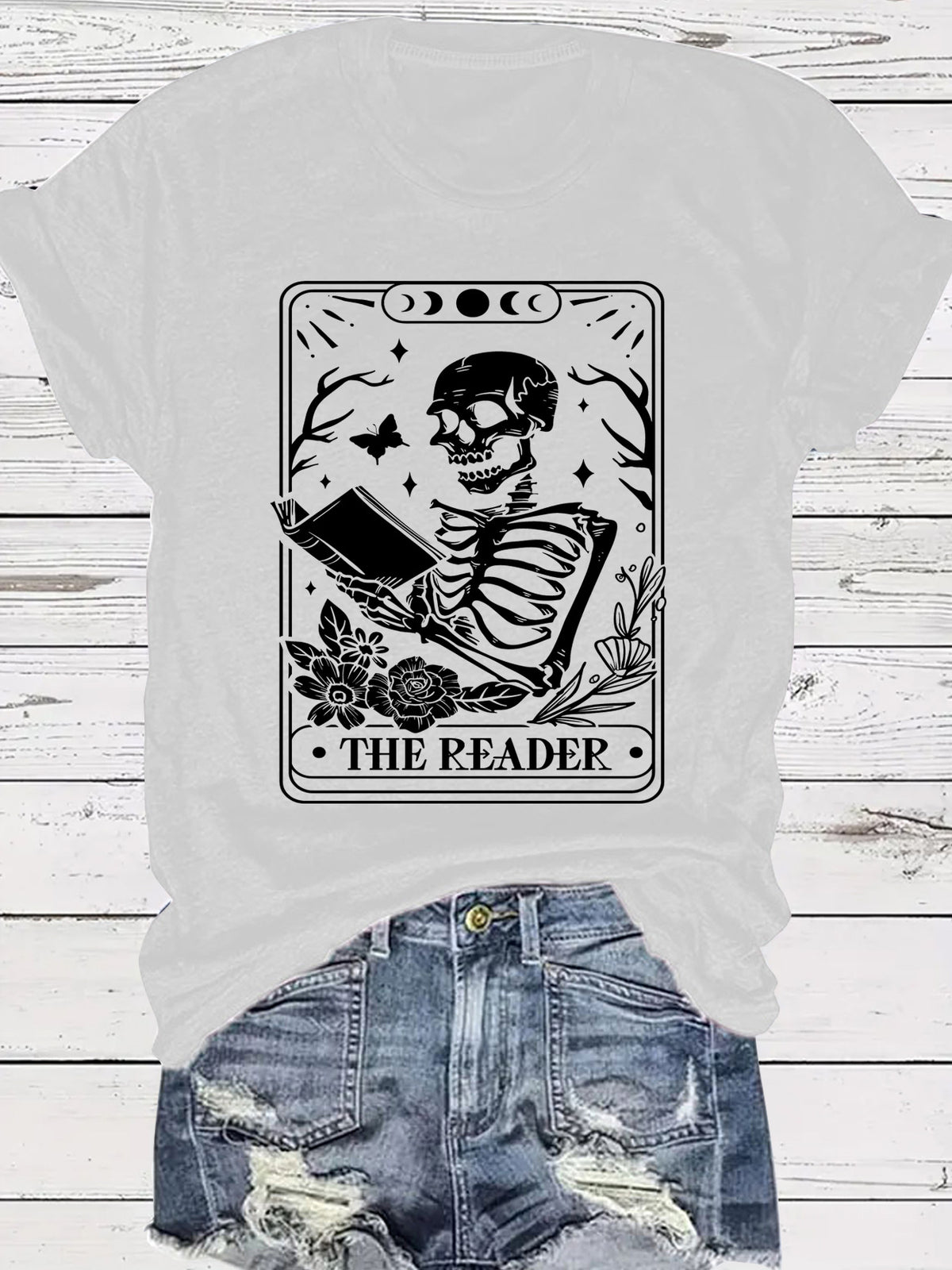The Reader Halloween Floral Skeleton Graphic T-Shirt from Mish Mash Market