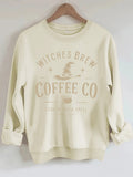 Witch's Brew Coffee Co. Halloween Graphic Sweatshirt - Casual Crewneck Pullover from Mish Mash Market