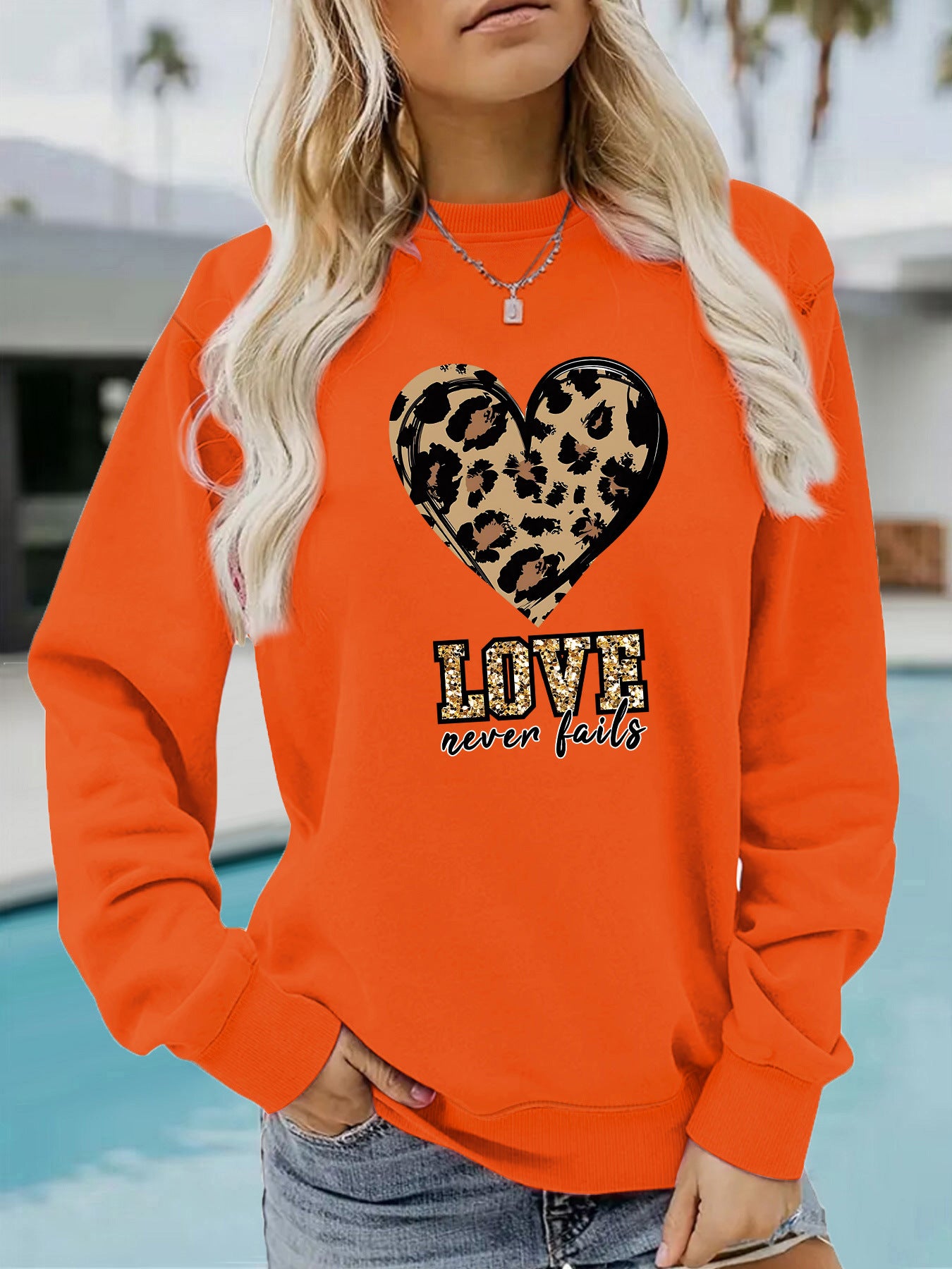 Love Never Fails Leopard Print Hoodie - Aesthetic Women’s Graphic Sweatshirt from Mish Mash Market