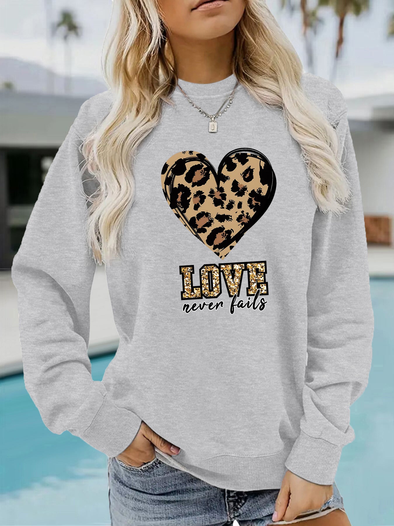 Love Never Fails Leopard Print Hoodie - Aesthetic Women’s Graphic Sweatshirt from Mish Mash Market