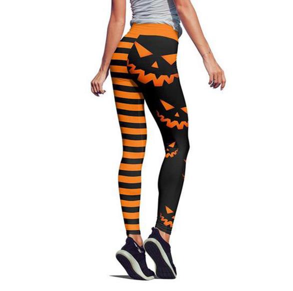 Women's Halloween Pumpkin Face Striped Leggings from Mish Mash Market